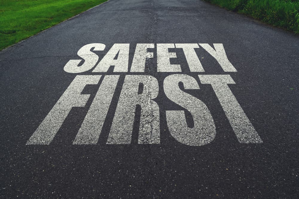 Road sign with 'Safety First' message, emphasizing safe driving and preventing traffic accidents.