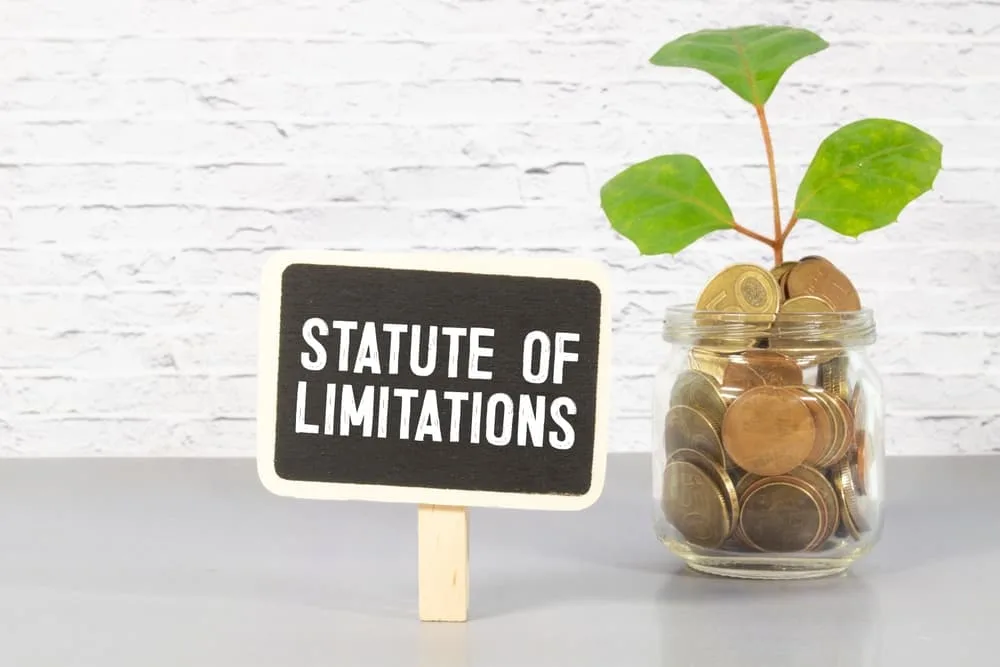 Statute of Limitations concept with South African flag background and notebook with inscription.
