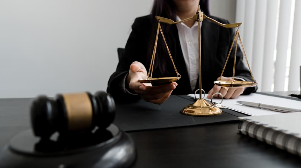 A female lawyer working in her office 