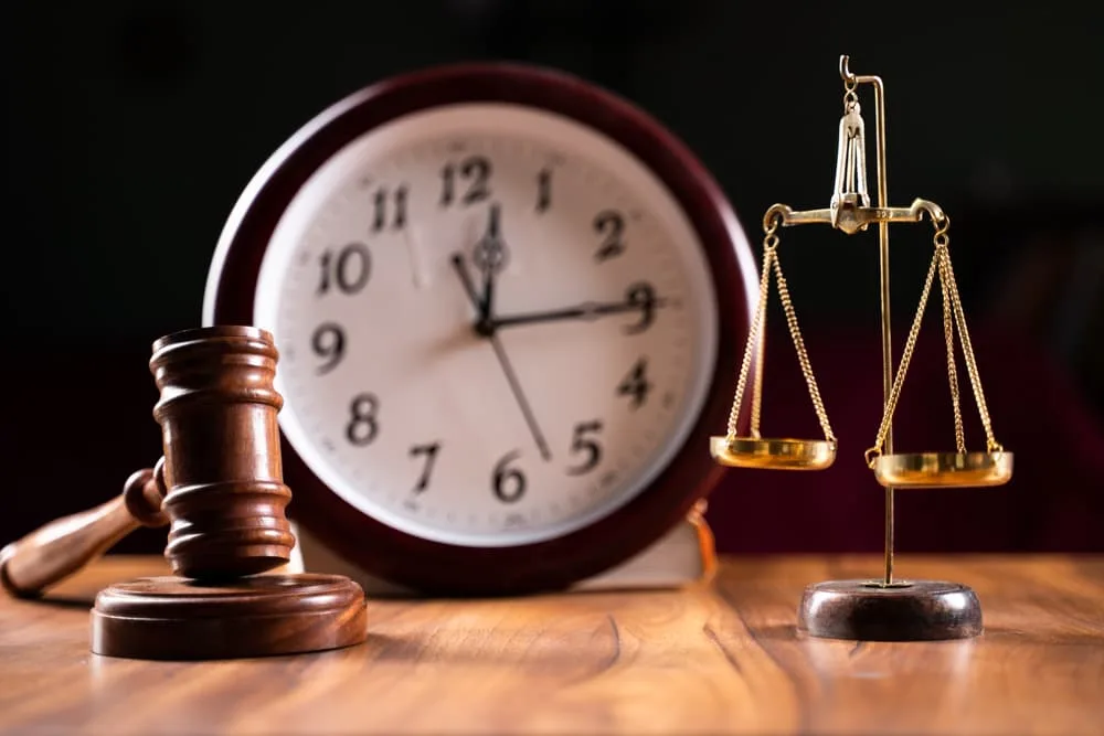 Timeline in judicial justice system by using judge hammer, balance scale and wall clock