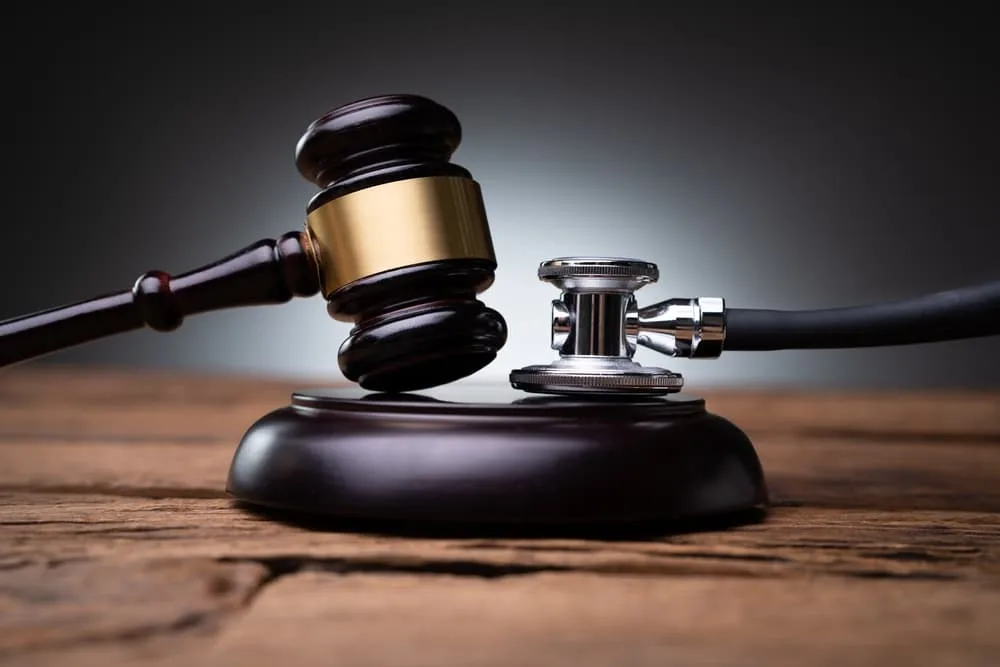 Judge's gavel and stethoscope